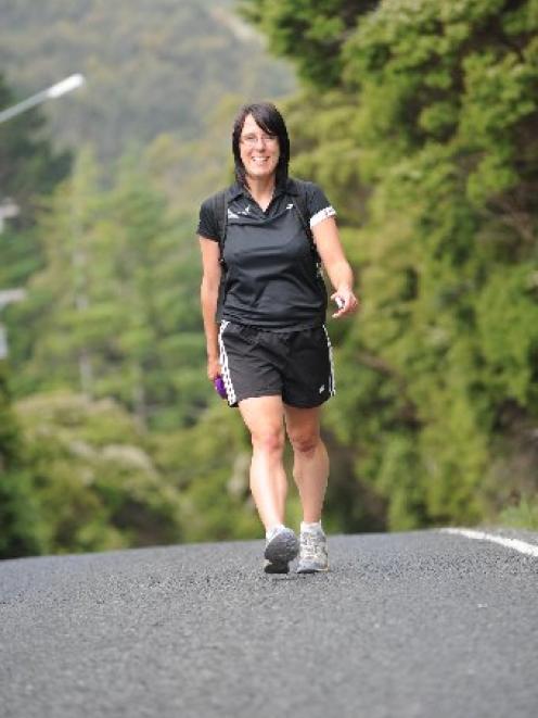 Sarah Naylor takes the last steps in her bid to walk down every street in Dunedin City. Photo by...