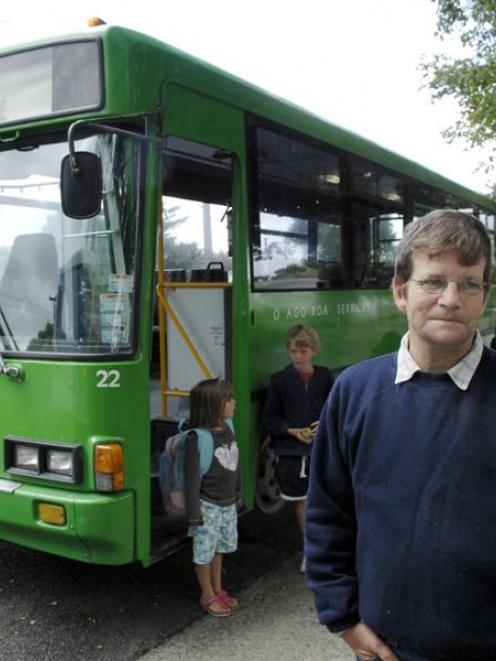 School-bus driver Graeme Wilson, outside Outram School yesterday, has serious concerns about...