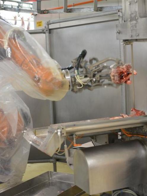 Scott Technology meat industry robotics, at work  at Silver Fern's Finegand plant. Photo by...