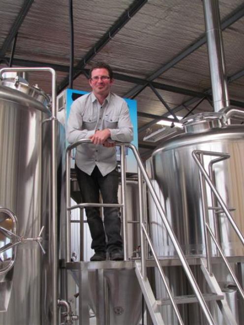 Scotts Brewing Co owner Phillip Scott, of Oamaru, views the brewery's new enlarged operation at...