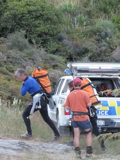 Canyoners arrive at the scene in Motatapu Gorge.
