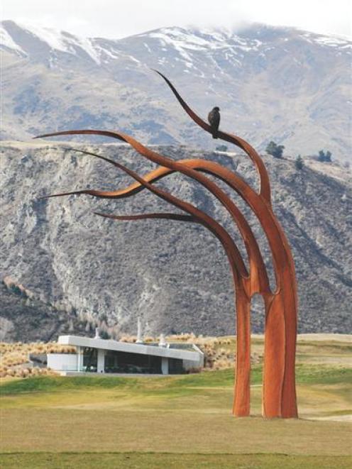 Sculpture Kelp, by artist Mark Hill, is one of more than a dozen cast iron and stainless steel...