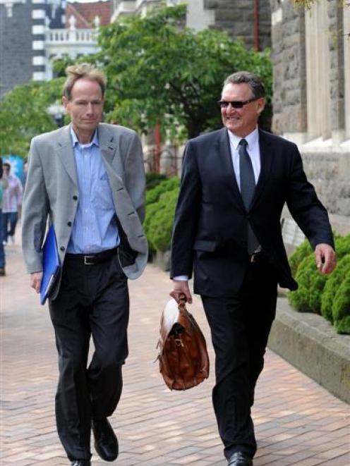 Sean Davison (left) and his lawyer, Roger Laybourn, leave the Hight Court at Dunedin following...