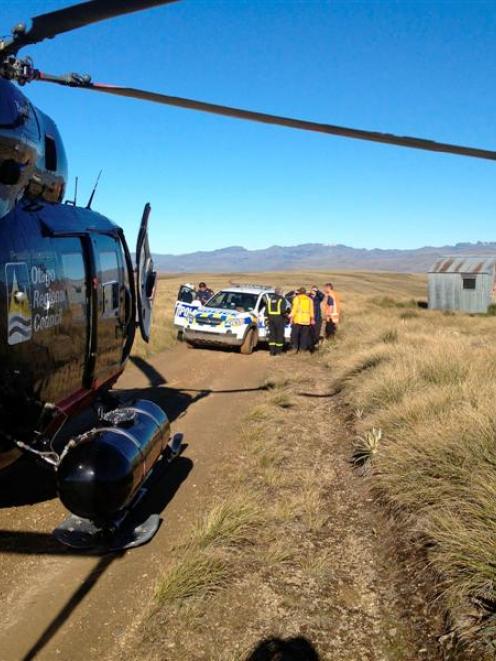 Search and rescue staff gather at Junction Hut where missing hunter Tim Harrex  had waited out...