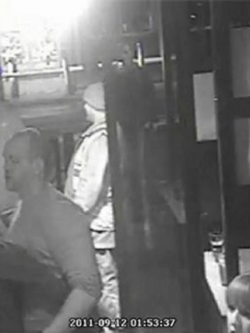 Security camera shows England Rugby player Mike Tindall getting close to an unknown blonde while...