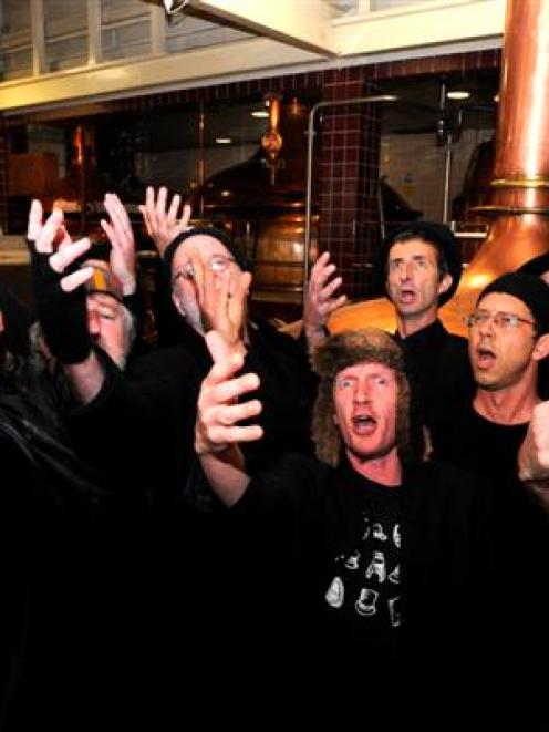 Serenading at Speight's Brewery in Dunedin yesterday are Spooky Men's Chorale members, some...