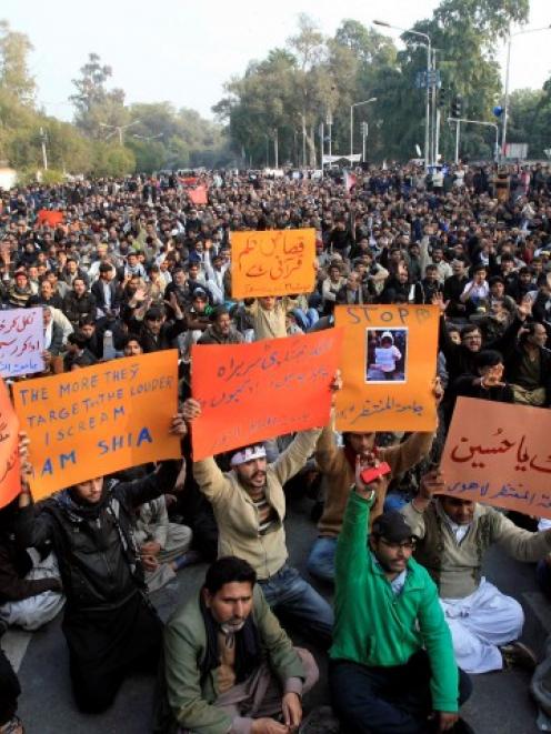 Shi'ite Muslims gather in Lahore to protest against last week's twin bomb attack in Quetta....