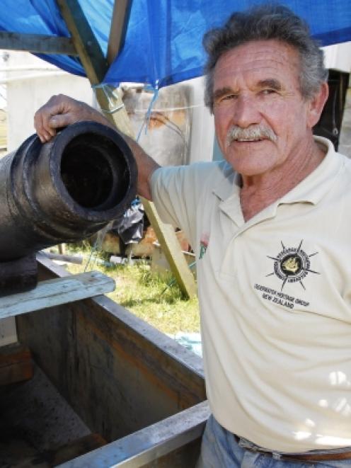 Shipwreck explorer Noel Hilliam with the 1821 French naval gun which may have been buried deep in...