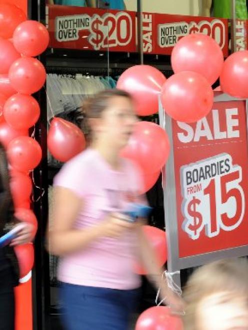 Shoppers on Dunedin's George St look for bargains on Boxing Day. Photo by Peter McIntosh.
