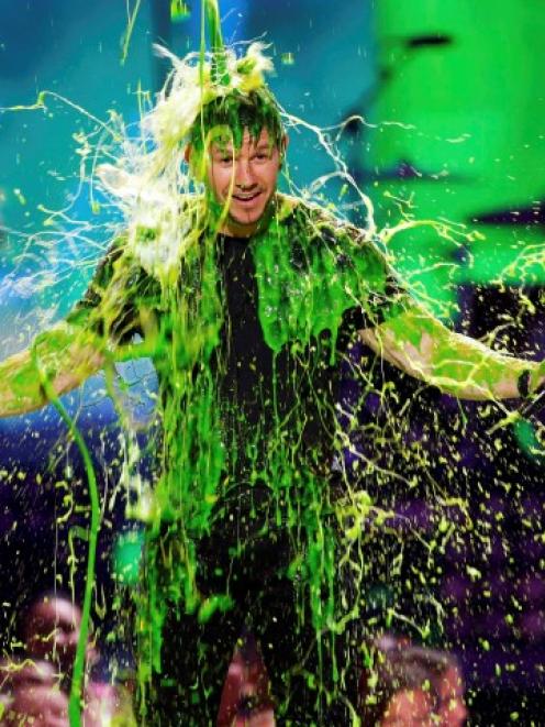 Show host Mark Wahlberg gets slimed at the 27th Annual Kids' Choice Awards in Los Angeles....