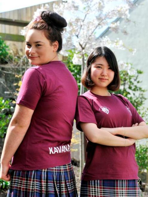 Sia Caldwell (left) and Sherry Sim model the 2013 ''Good One'' T-shirts they designed. Photo by...