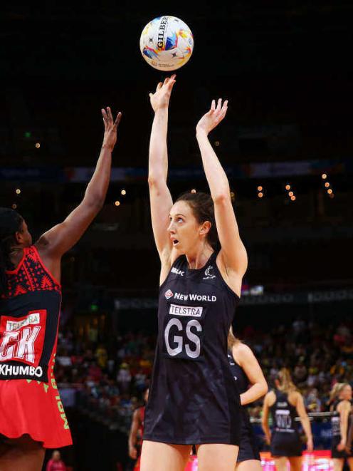 Silver Ferns goal shoot Bailey Mes takes a shot during their win over Malawi. Photo by Getty Images.