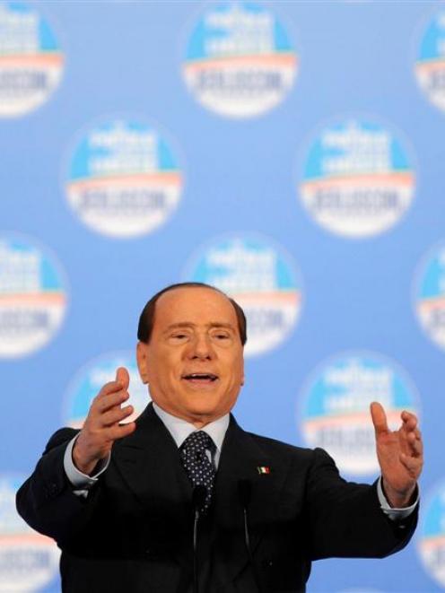 Silvio Berlusconi speaks during a political rally in Turin . REUTERS/Giorgio Perottino