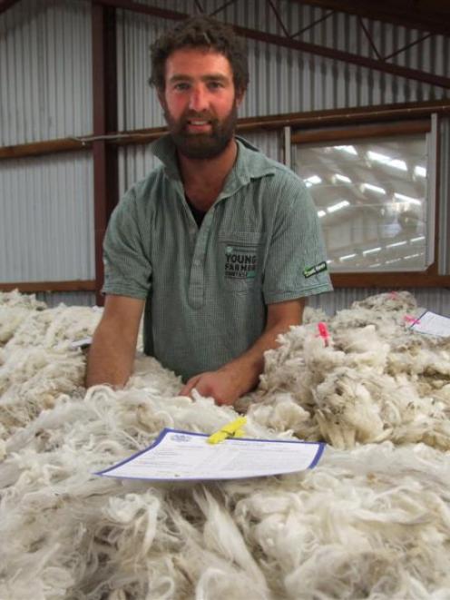 Simon Paterson displays one of the Armidale stud's entries in the national Golden Fleece...