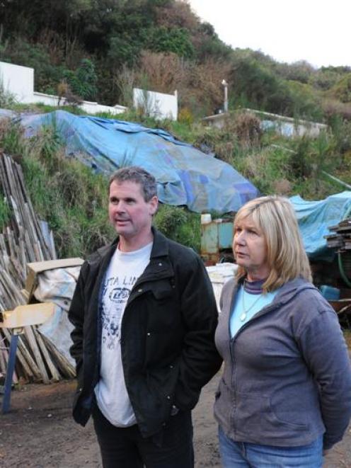 Simon Sutherland and Jennifer Jones say their neighbour has turned two vacant sections next door...