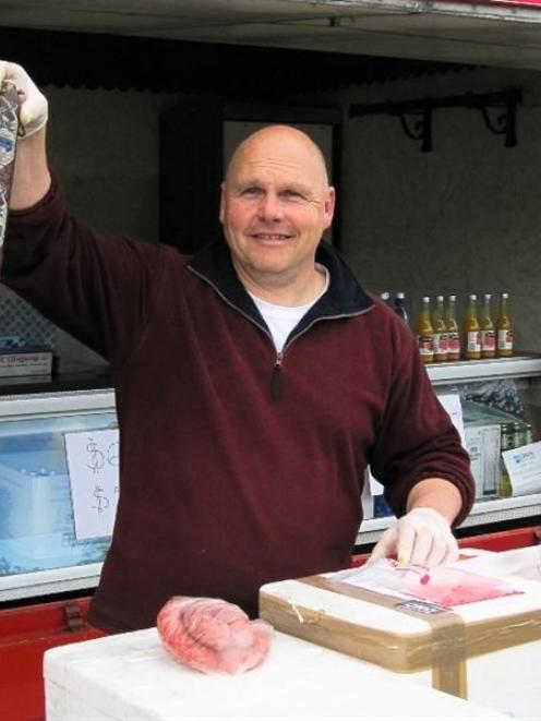 Simon Tiefen-bach, of Wanaka's Deep Creek Delicatessen, with some of his award-winning sausages....