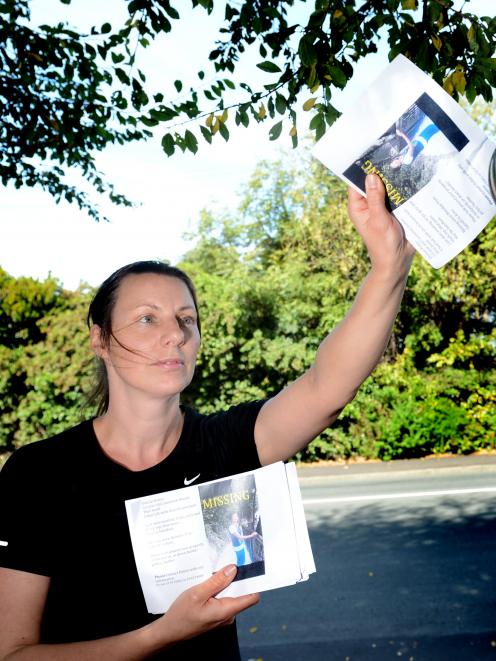 Sinead Linwood, niece of missing woman Denise Potter, delivers leaflets to households in High St,...