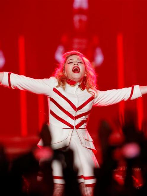 Singer Madonna performs at the Staples Center as part of her MDNA world tour.  REUTERS/Mario...
