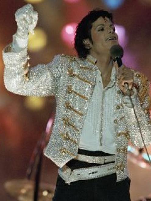 Singer Michael Jackson, performs during "Victory Tour" in this July 1984 file photo taken in the...