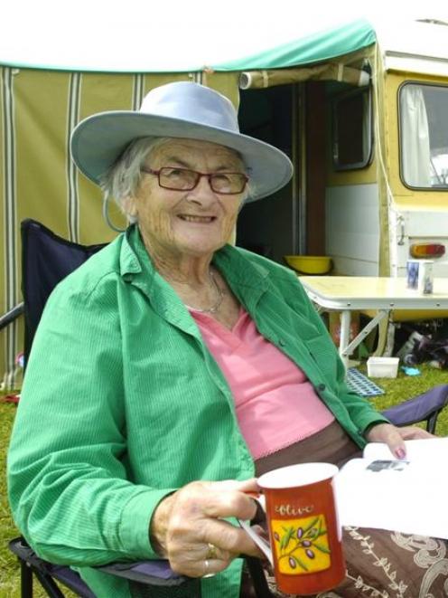 Sitting back with a cuppa at her camp site at the Clyde Holiday and Sporting Complex is Sheila...