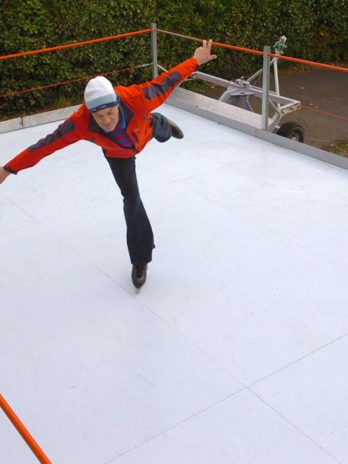 Dunedin figure skater Keith Dickson goes for a whirl on his portable polymer skating rink. Photo...
