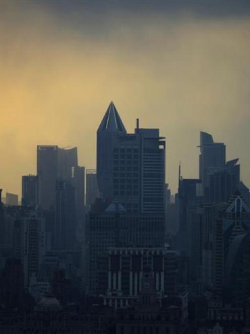 Skyscrapers in downtown Shanghai last month. Photo by Reuters.