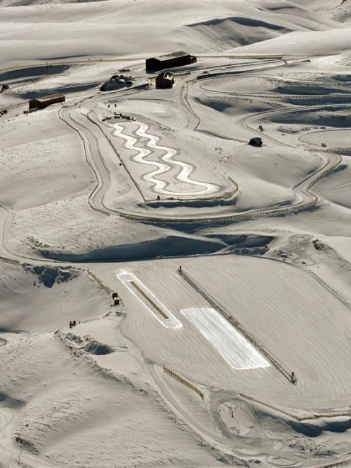 Slick ice surfaces catch the light on two of the Southern Hemisphere Proving Grounds test tracks....