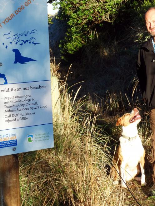 Department of Conservation ranger Simon Alefosio-Tuck and his dog, Sam, check on the new wildlife...