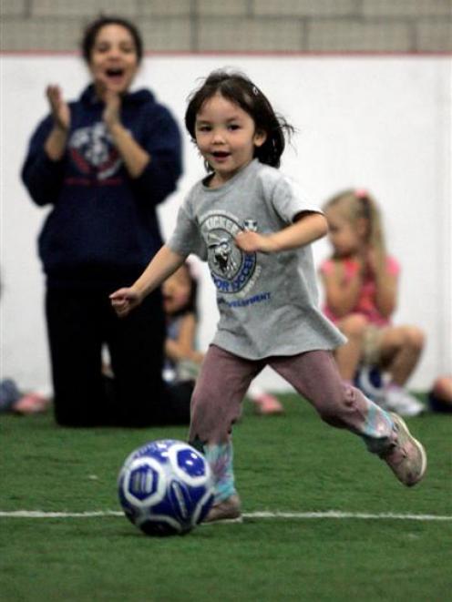Soccer builds object-control skills that later may contribute to overall fitness. Photo from 'Los...