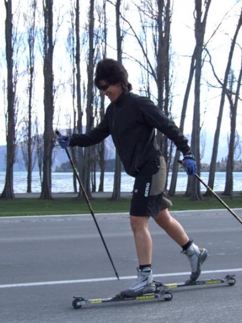 Sofia Tysoe, of Portugal, cruises the Wanaka lakefront on her roller skis yesterday morning....