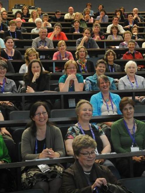 Some of the delegates listen to the keynote speaker former Telecom chief executive Theresa...