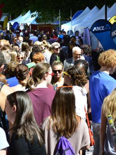 Some of this year's 25,000 students  look at what is on offer at the Museum Reserve yesterday as...