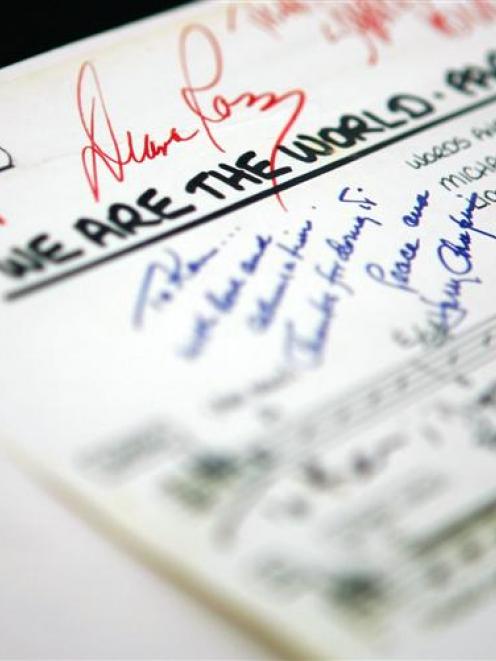 Songsheets for the 1985 recording of We are the World, signed by artists including Diana Ross and...
