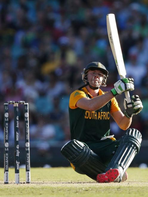 South Africa's AB de Villiers hits a boundary during the Cricket World Cup match against the West...
