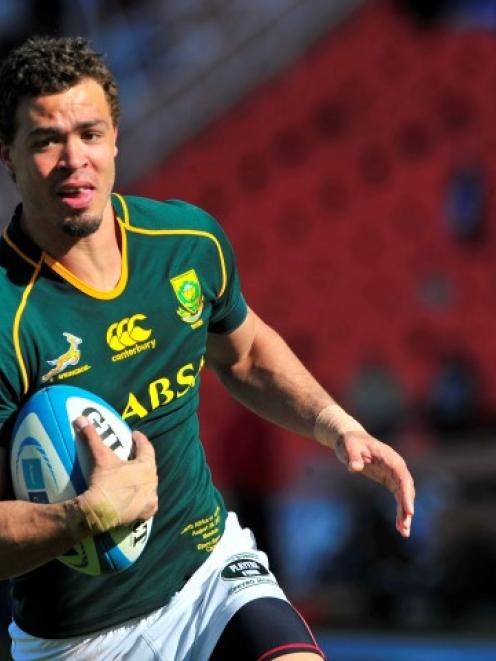 South Africa's Bjorn Basson crosses to score a try against Argentina in Mendoza. REUTERS/Daniel...