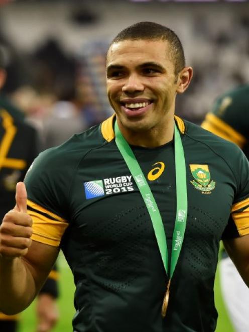 South Africa's Bryan Habana gives the thumbs-up to fans after the victory. Photo Reuters