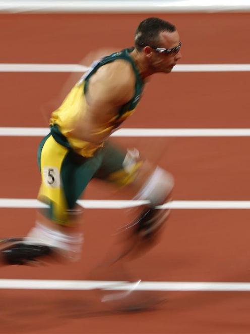 South Africa's Oscar Pistorius competes in his men's 400m semi-final during the London 2012...