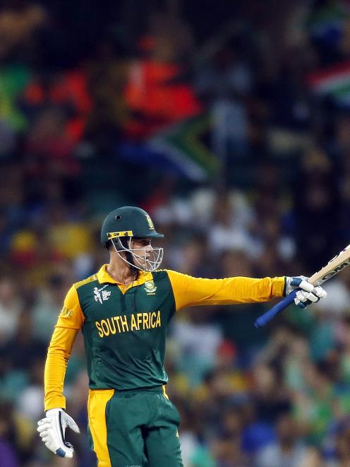 South Africa's Quinton de Kock celebrates reaching fifty runs during the Cricket World Cup...