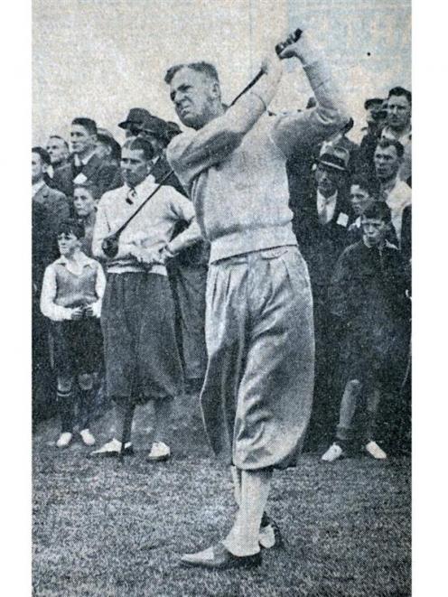 South African Bobby Locke drives off at the 14th tee at the Otago Golf Club's Balmacewen course...