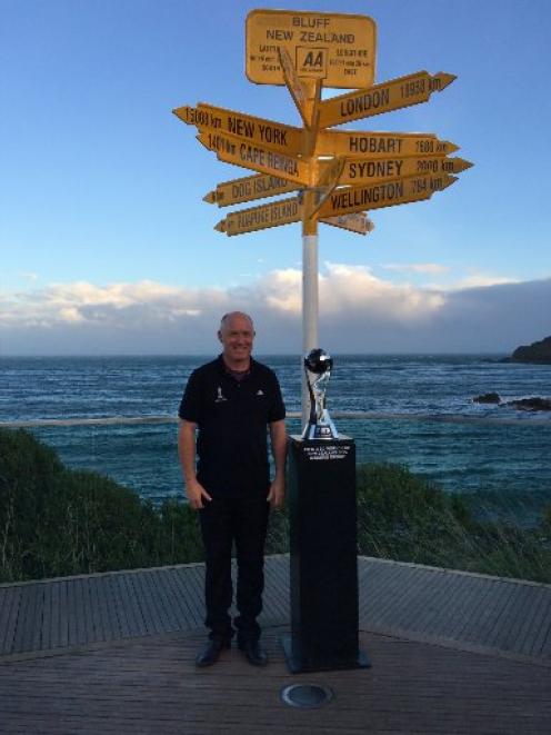 South Island football ambassador Mike McGarry with the Fifa Under-20 World Cup trophy in Bluff....