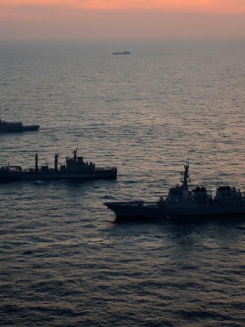 South Korean and US warships take part in a joint maritime exercise in the East Sea off Pohang,...