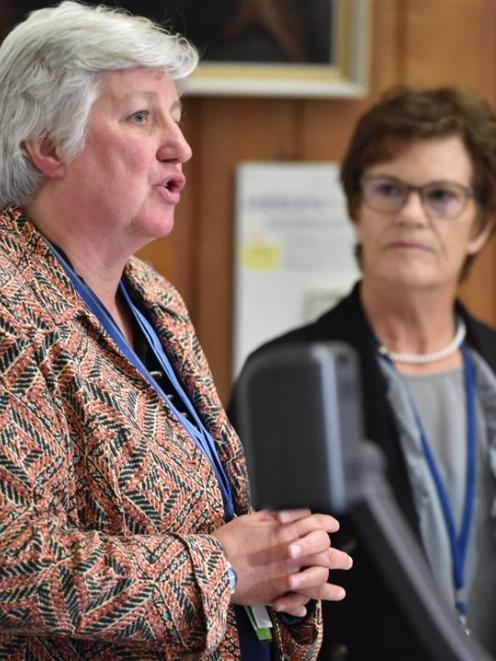 Southern District Health Board chief executive Carole Heatly (left) speaks to media while...