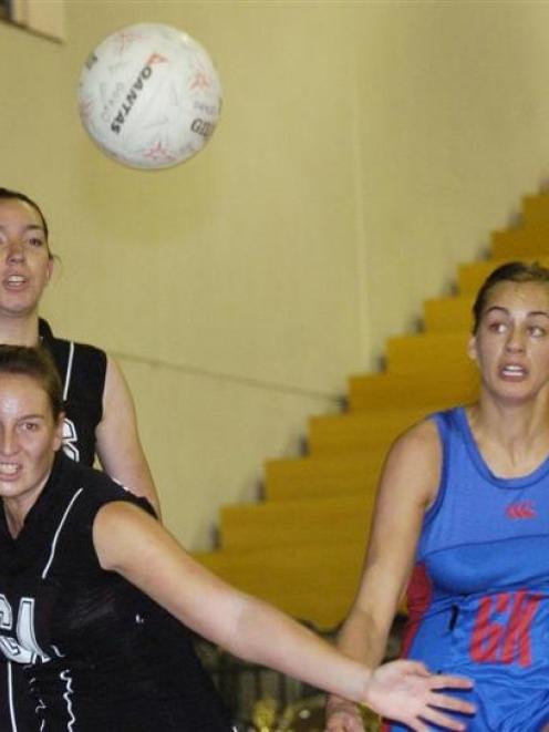 Southern goal attack Rihi Salter (front) chases the rebound in front of (from left)Grier Campbell...
