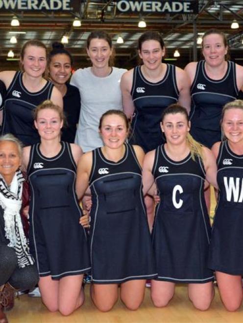 Southern players and support staff celebrate their win in the Dunedin premier netball final at...