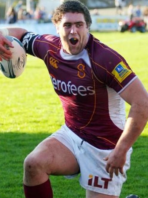 Southland captain Jamie Mackintosh rises to his feet after scoring a try against North Harbour in...
