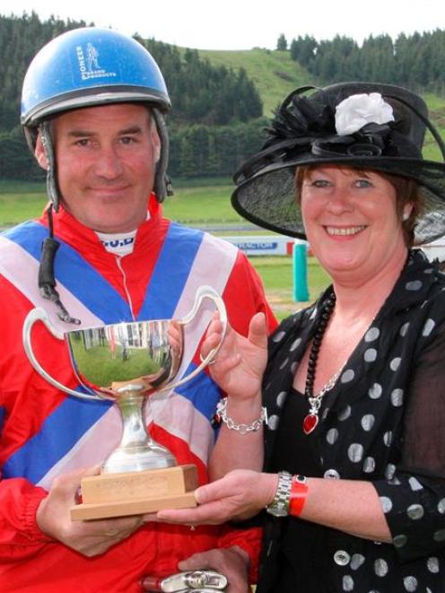 Sponsor Wendy Lamb presents Clark Barron with the trophy for winning  the Brothers in Arms...