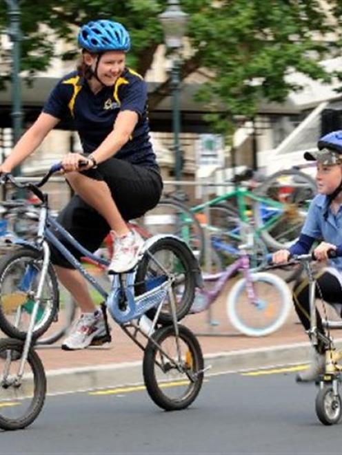 Sport Otago Green Prescription co-ordinator Nicola Shanks manages a double-decker backwards bike,...