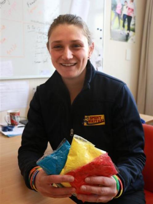 Sport Waitaki co-ordinator Kate Holland gears up for the 2014 Rainbow Colour Run in Oamaru. Photo...