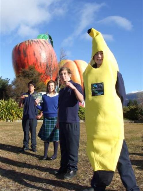 Spreading the word about Fairtrade goods were Cromwell College pupils (from left) Josh Thompson ...