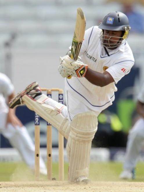 Sri Lanka's Rangana Herath hits out against England at Headingley. REUTERS/Philip Brown